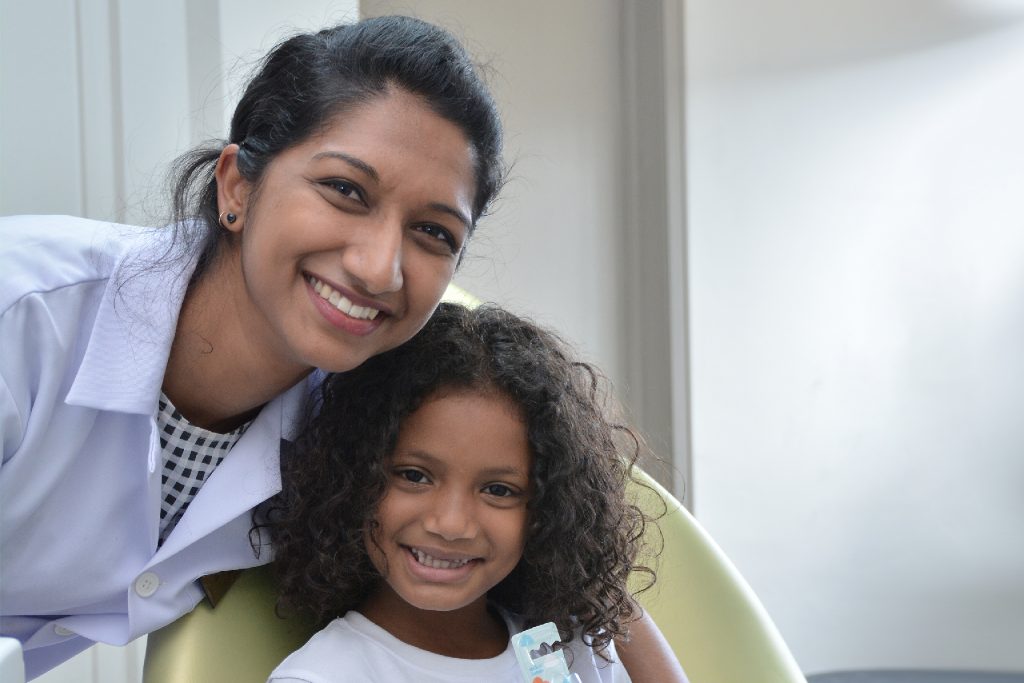 My Dentistree Dentist - Dr Deeksha Abelak with child